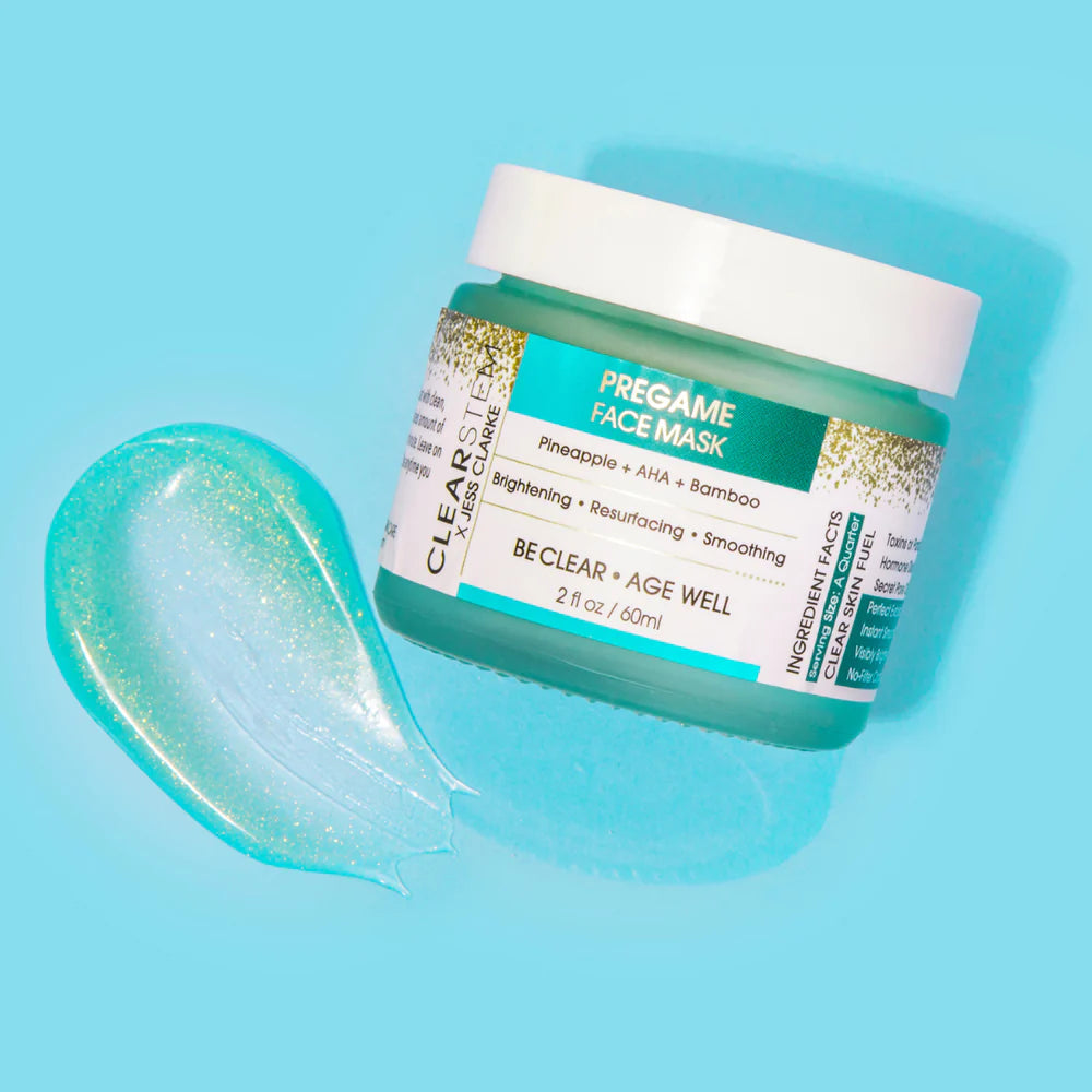 Jar of CLEARSTEM Pregame Face Mask on a blue background with a swipe of the product next to it