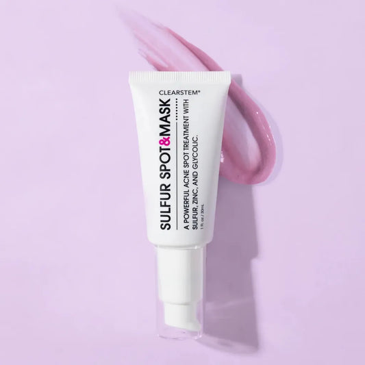 CLEARSTEM Sulfur Spot Mask laying on a light purple background with some of the product smeared behind it