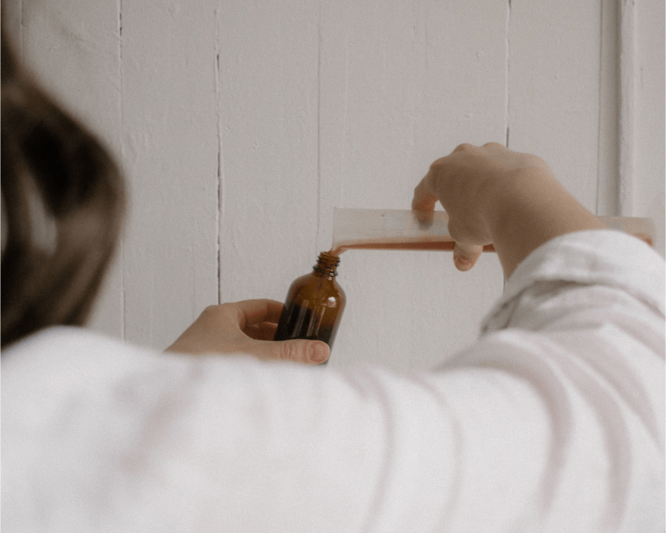 Naturopathic Doctor, Amelia Patillo, measuring herbal tincture